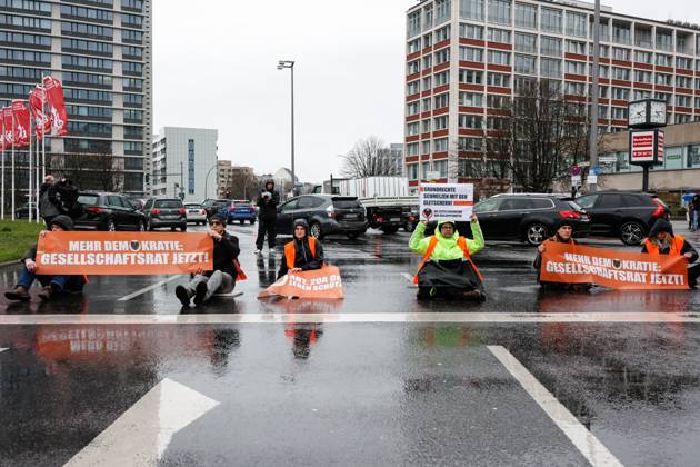 Berlin, climate activists block street at Ernst-Reuter-Platz