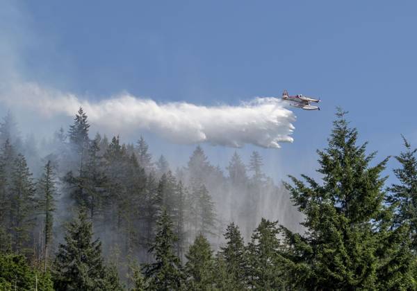 Canada, tanker planes drop water on a brush fire near Whyte Lake in West Vancouver