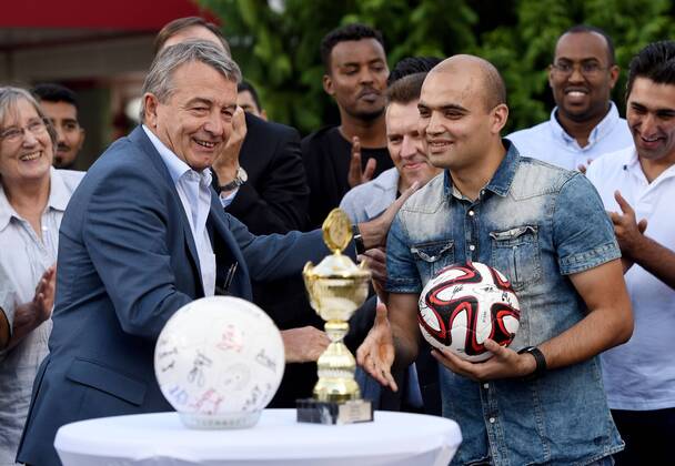 Football match SG Egelsbach Refugees United against DFB company team