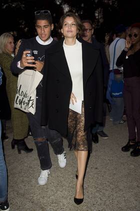 Laetitia Casta with transparent skirt at Paris Fashion Week