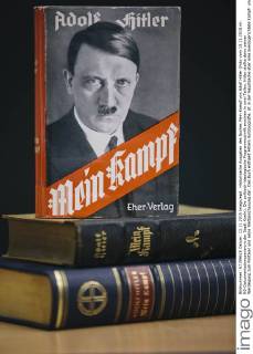 Notice: Employees of a Berlin district office read the original edition of Adolf Hitler's Mein Kampf while working on the book.