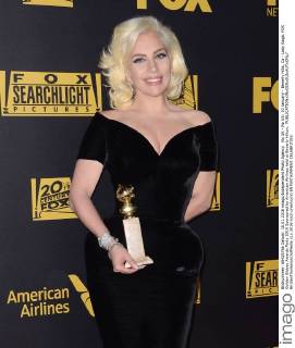 Lady Gaga with her Golden Globe at the FOX After Party