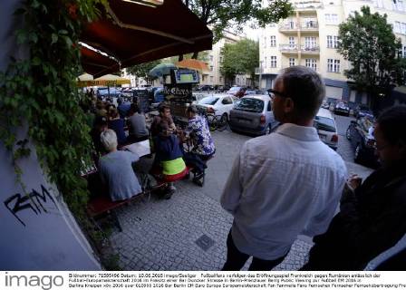 Football fans watch the European Championship opening match in Berlin