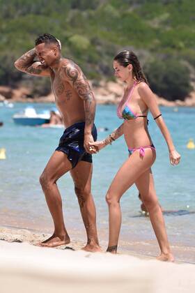 Kevin Prince Boateng and Melissa Satta on the beach in Sardinia