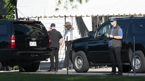 Donald Trump on his way to the golf course