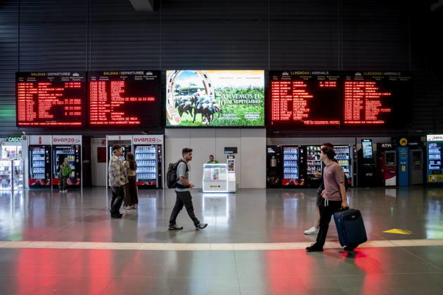 Spain: Passengers in Madrid during the summer return journey